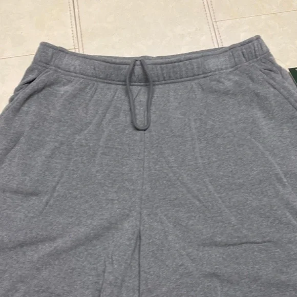 Grey shorts size l tee shirt material. $6 each. I have 24 of them - Picture 1 of 4